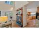 Inviting living room with a fireplace, hardwood floors, and an open layout connecting to the kitchen at 276 Greyfriars Rd, Mooresville, NC 28117