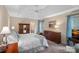 Spacious bedroom with a tray ceiling, carpeted floor, and access to the Primary bathroom at 276 Greyfriars Rd, Mooresville, NC 28117