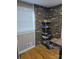 Finished basement space features exposed brick and wood flooring at 3025 School St, Claremont, NC 28610