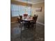 Cozy dining room with natural light, a round table, and comfortable seating at 3025 School St, Claremont, NC 28610