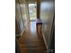 Inviting hallway features wood flooring and a bench seat at 3025 School St, Claremont, NC 28610