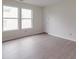 Airy bedroom featuring light gray flooring, bright natural light, and neutral paint at 3227 Deshler Morris Ln, Charlotte, NC 28216