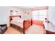 Cozy bedroom with warm lighting, floral bedding, and a charming dresser at 3286 Shining Rock Sw St, Concord, NC 28027