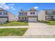 Attractive two-story home with a two-car garage, inviting front porch, and neatly manicured lawn at 3286 Shining Rock Sw St, Concord, NC 28027