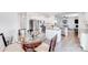 Well-designed kitchen with stainless steel appliances, an island, and an adjacent dining area at 3286 Shining Rock Sw St, Concord, NC 28027