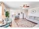 Open-concept living space with hardwood floors, neutral decor, and a view of the kitchen at 3286 Shining Rock Sw St, Concord, NC 28027