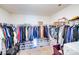 Spacious walk-in closet with ample storage and organization racks at 3286 Shining Rock Sw St, Concord, NC 28027