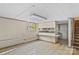 Basement area featuring a bar counter and cabinets, with stairs leading up at 3320 28Th Ne St, Hickory, NC 28601