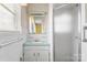 Cozy bathroom features shower, single sink, and all-white tile at 3320 28Th Ne St, Hickory, NC 28601