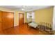 This bright bedroom features hardwood floors and two closets for ample storage at 3320 28Th Ne St, Hickory, NC 28601