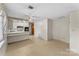 Eat-in kitchen with breakfast bar features white cabinets and appliances at 3320 28Th Ne St, Hickory, NC 28601