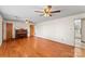 An inviting open floor plan with hardwood floors offers versatile living space and views into the eat-in kitchen at 3320 28Th Ne St, Hickory, NC 28601