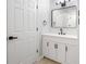 Updated bathroom with modern vanity, fixtures, and a large mirror that reflects the walk-in shower at 3715 Dallas High Shoals Hwy, Dallas, NC 28034