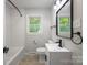 Recently remodeled bathroom with subway tile and modern fixtures and a window with a green view at 3715 Dallas High Shoals Hwy, Dallas, NC 28034