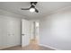 Bedroom with updated ceiling fan, closet, doors, and modern flooring at 3715 Dallas High Shoals Hwy, Dallas, NC 28034