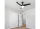 Bedroom with updated ceiling fan, closet, and modern flooring at 3715 Dallas High Shoals Hwy, Dallas, NC 28034