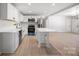 Bright kitchen with updated appliances and a functional center island at 3715 Dallas High Shoals Hwy, Dallas, NC 28034