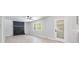 Spacious living room with a stylish brick fireplace and modern ceiling fan at 3715 Dallas High Shoals Hwy, Dallas, NC 28034