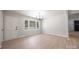 Open-concept living room features modern light fixtures and updated finishes at 3715 Dallas High Shoals Hwy, Dallas, NC 28034