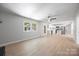 Bright, open-concept living room and kitchen with modern flooring and updated fixtures and finishes at 3715 Dallas High Shoals Hwy, Dallas, NC 28034