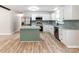 Stylish kitchen with an island, stainless appliances, granite countertops and backsplash at 4303 Greenhaven Ln, Gastonia, NC 28056