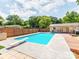 Beautiful backyard pool featuring a diving board and a spacious deck at 4303 Greenhaven Ln, Gastonia, NC 28056