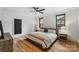 Inviting bedroom with hardwood floors, natural light, and a cozy atmosphere at 438 Wonderwood Dr, Charlotte, NC 28211
