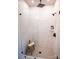 Modern tiled bathroom with a frameless glass shower, sleek fixtures, and minimalist design at 451 Old Town Village Rd, Waxhaw, NC 28173
