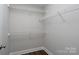 Walk in closet with hardwood floors and wire shelving at 556 Westwood Dr, Kannapolis, NC 28081