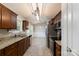Modern kitchen with stainless steel appliances, granite countertops, and custom cabinetry for plenty of storage at 556 Westwood Dr, Kannapolis, NC 28081