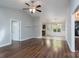 Spacious living room with hardwood floors that flows into the dining area and open-concept kitchen at 556 Westwood Dr, Kannapolis, NC 28081