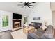 Inviting living room with a stone fireplace, and comfortable couches at 585 Highland Ridge Rd, Mooresville, NC 28115