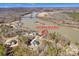 Aerial view showcasing the property's riverside location and the surrounding natural landscape at 5888 Wood Duck Way, Catawba, NC 28609