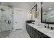 Elegant bathroom featuring a double vanity, marble countertops, and a glass-enclosed shower at 5888 Wood Duck Way, Catawba, NC 28609