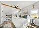 Bedroom boasts a ceiling fan, natural light from two windows, and coordinated decor at 5888 Wood Duck Way, Catawba, NC 28609
