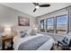 Serene bedroom with plush bedding, bedside tables, and a large window overlooking a deck at 5888 Wood Duck Way, Catawba, NC 28609