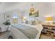 Cozy bedroom featuring a plush bed, neutral colors, bedside tables and bright natural light at 5888 Wood Duck Way, Catawba, NC 28609