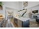 Open concept kitchen with island, stainless appliances, and seamless flow into living area at 5888 Wood Duck Way, Catawba, NC 28609