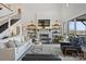 Bright, open living room with a cozy fireplace, tall ceilings, and natural light at 5888 Wood Duck Way, Catawba, NC 28609