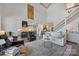 Inviting living room showcasing high ceilings, a fireplace, and a comfortable seating area at 5888 Wood Duck Way, Catawba, NC 28609