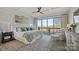 Serene main bedroom with sliding glass doors and a private balcony showcasing panoramic views at 5888 Wood Duck Way, Catawba, NC 28609