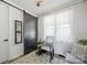 Bright office space with sliding barn door, neutral color palette and work-from-home desk setup at 5888 Wood Duck Way, Catawba, NC 28609