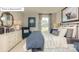 A serene bedroom with an accent chair, dresser, and patterned curtains at 7027 Butternut Oak Ter, Huntersville, NC 28078