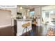 Bright kitchen with granite countertops, stainless steel appliances, and a cozy breakfast bar at 7027 Butternut Oak Ter, Huntersville, NC 28078
