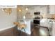Bright kitchen with granite countertops, stainless steel appliances, and stylish decor at 7027 Butternut Oak Ter, Huntersville, NC 28078
