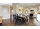 Open living space featuring a modern kitchen, dining area, and a comfortable living room at 7027 Butternut Oak Ter, Huntersville, NC 28078