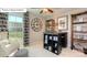 A well-lit home office with desk space, chair, and a window view at 7027 Butternut Oak Ter, Huntersville, NC 28078