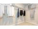 Walk-in closet has ample storage space with installed shelving for easy organization at 7027 Butternut Oak Ter, Huntersville, NC 28078