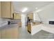 Charming kitchen featuring stainless steel appliances, tile backsplash and breakfast bar at 7935 Harrington Woods Rd, Charlotte, NC 28269