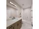 Bathroom with a white vanity, granite countertops, and a walk-in shower at 8048 Cedarsmith Ct, Charlotte, NC 28217